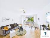 Wohnzimmer - Kurgebiet: 4-Zi. Design-Wohnung mit Südbalkon an der Priegerpromenade - Erstbezug nach Kernsanierung