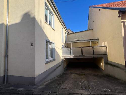 Seitenansicht mit Carport und Terrasse - Einfamilienhaus mit 146,00 m² in Duchroth zum Kaufen