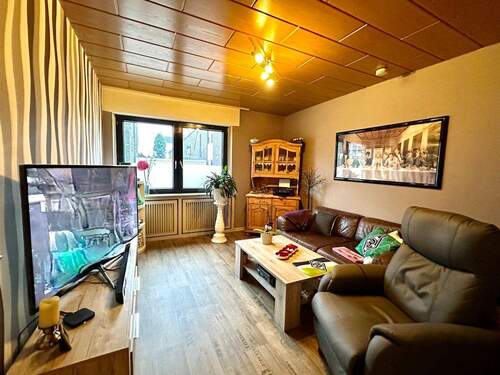 Wohnzimmer Wohnung Erdgeschoss - 7 Zimmer Mehrfamilienhaus, Wohnhaus in Neuss