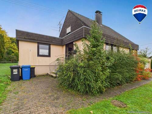 RE/MAX Immobilien DeLux Einfamilienhaus Wallerfangen-Oberlimberg Hauseingang - 