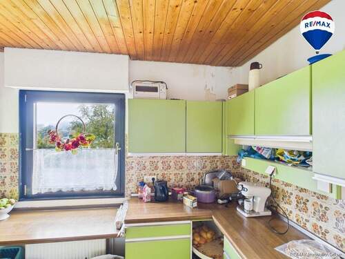 RE/MAX Immobilien DeLux Einfamilienhaus Wallerfangen-Oberlimberg Küche - 
