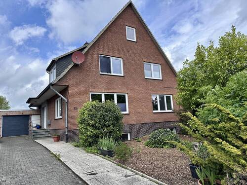Titelfoto - Attraktives Mehrfamilienhaus *saniert und gut vermietet*