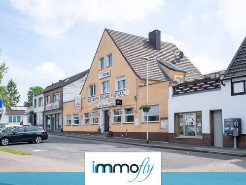 Hausansicht - Sanierungsbedürftiges Wohn- und Geschäftshaus