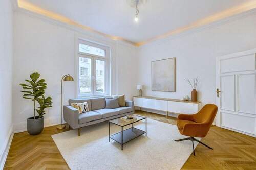 Titelbild - Stilvolle Hochparterre-Wohnung im denkmalgeschützten Altbau mit Terrasse