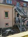 Rückseite: Stahltreppe zu den Wohnungen - Mehrfamilienhaus, Wohnhaus mit 200,00 m² in Sankt Ingbert zum Kaufen
