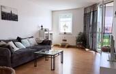 Wohnzimmer - Gemütliche Wohnung mit Balkon und Garagenstellplatz