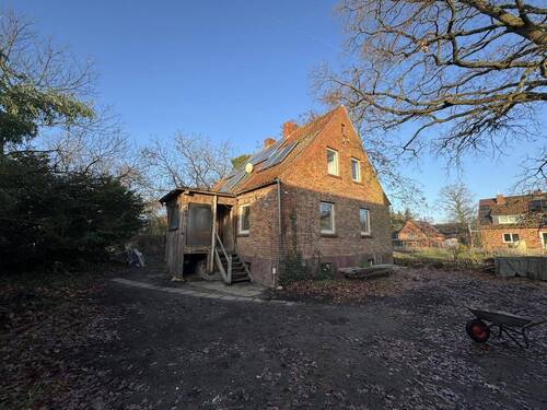 Seitenansicht Hauseingang - 4 Zimmer Einfamilienhaus zum Kaufen in Dannenberg