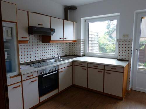 Küche mit gepflegter Einbauküche und Terrassenzugang - Terrassenwohnung mit 68,00 m&sup2; in Lauenburg/Elbe zur Miete