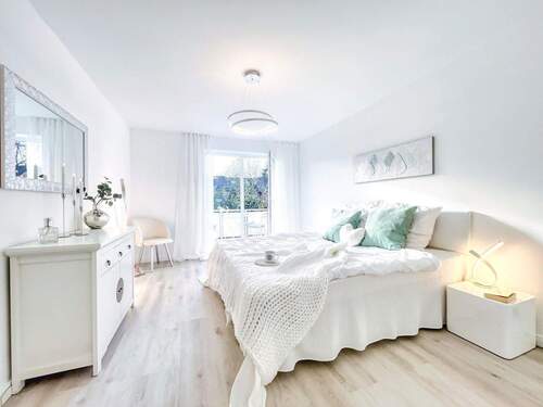 Schlafzimmer mit Balkon - 