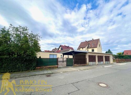 Nordansicht - Garagen und Carport - 