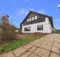 Einfamilienhaus mit großem Platzangebot und Sanierungsbedarf in Eppelborn Wiesbach