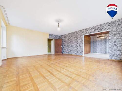 REMAX Immobilien DeLux Einfamilienhau Wohnzimmer Eppelborn Mark Borowicz - 