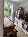 Küche mit Blick zur Terrasse - 