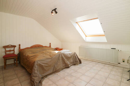 Zimmer im Dachgeschoss - 