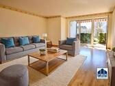 Wohnzimmer mit Terrasse - Moderne Erdgeschosswohnung mit sonniger Terrasse