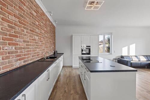 Bild 1 - Lichtdurchfluteter Bungalow auf ca. 165 m² - stilvolles Wohnen auf einer Ebene mit Garten & Terrasse