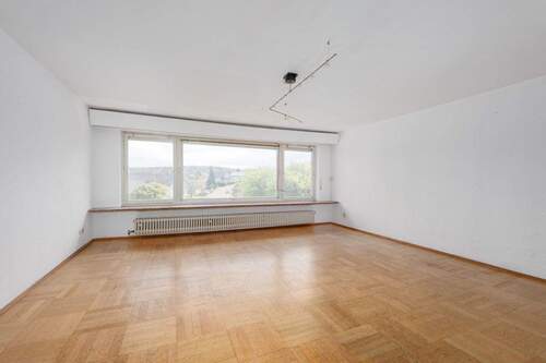 Wohnzimmer EG - 5 Zimmer Einfamilienhaus zum Kaufen in Remchingen-Nöttingen