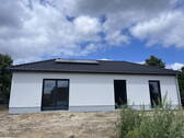 Terrassenseite - Bungalow in Holdenstedt - 379.000,00 EUR Kaufpreis, ca.  113,00 m² Wohnfläche