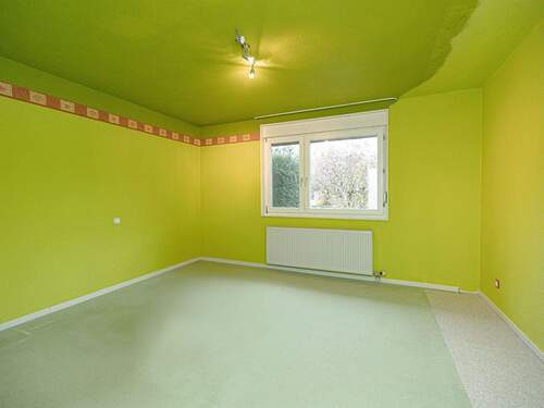 Schlafzimmer mit Blick zun Garten - 
