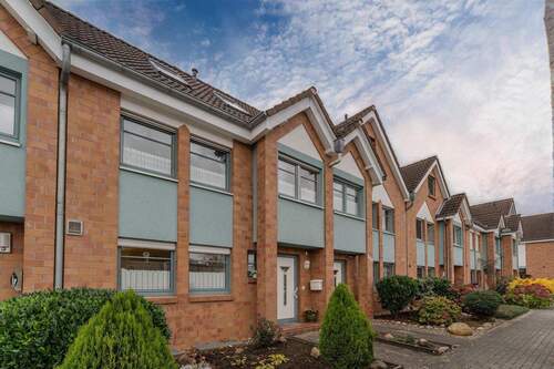 Außenansicht - Charmantes Reihenmittelhaus in Split-Level-Bauweise in gefragter Lage