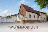 Außenansicht - MG - Solides Einfamilienhaus mit Doppelgarage, Garten & Potenzial in zentraler Lage von Spesbach