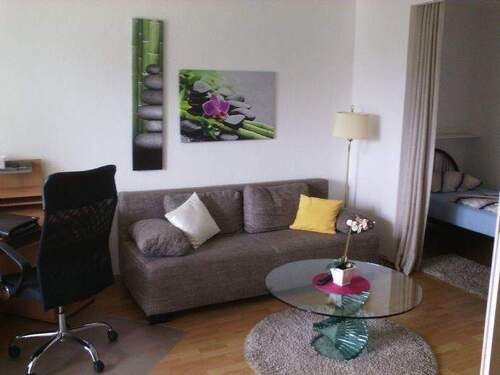 Wohnzimmer - 1 Zimmer Etagenwohnung zum Kaufen in Bremen