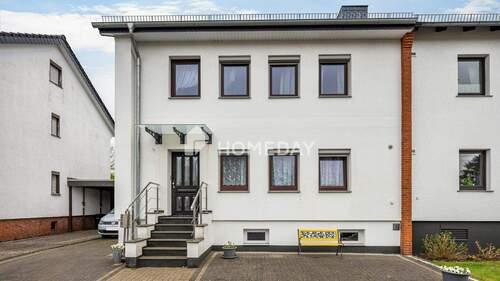 Außenansicht 3 - Modernisiertes Einfamilienhaus mit flexibler Aufteilung, viel Platz und großem Garten