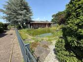 Blick auf die Garage mit Werkstatt - 