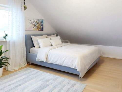 Schlafzimmer im Dachgeschoss - 