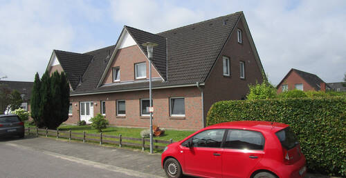 2. Straßenblick auf die Nordostseite des Mehrfamil - Etagenwohnung zum Kaufen in Neuenkirchen