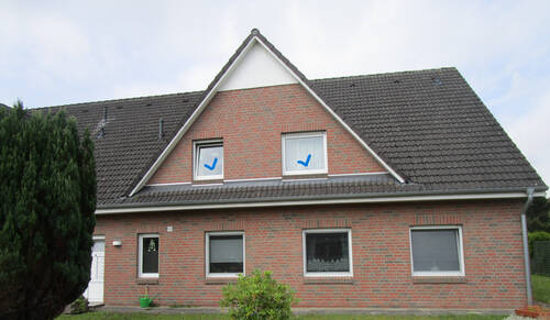 4. Blick auf die Ostseite des Mehrfamilienhauses - Etagenwohnung in Neuenkirchen