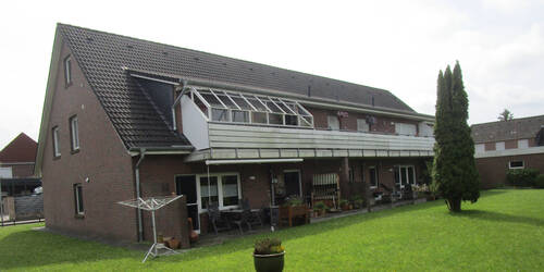 12. Blick auf die Nordwestseite des Mehrfamilienha - Etagenwohnung mit 83,00 m&sup2; in Neuenkirchen zum Kaufen