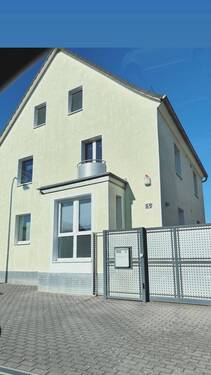 Ansicht mit Tor.jpg - 5 Zimmer Mehrfamilienhaus, Wohnhaus zum Kaufen in Kleinostheim