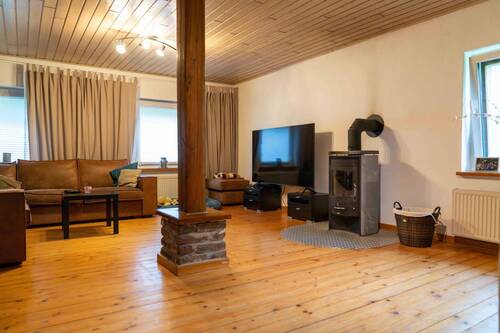 Wohnzimmer mit Kaminofen - 