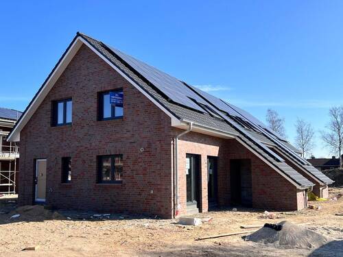 Giebelansicht - Reihenendhaus mit 97,90 m&sup2; in Kutenholz zur Miete