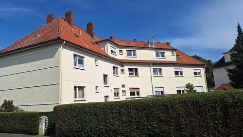 Immobilie. Hinteransicht. Südausrichtung - Mehrfamilienhaus im Jadeviertel von Wilhelmshaven mit 10 Wohneinheiten