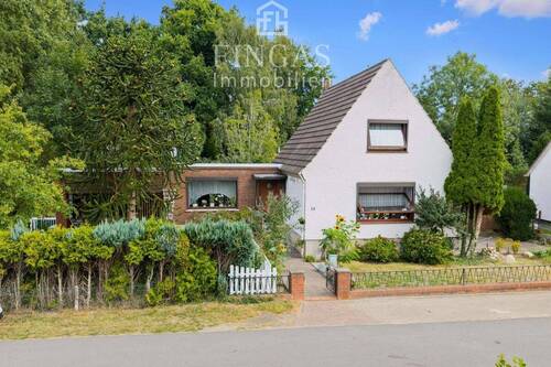 Außenansicht - Mehrfamilienhaus, Wohnhaus mit 122,00 m&sup2; in Ritterhude zum Kaufen