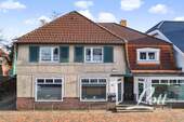 Bild 2 - 3 Zimmer Mehrfamilienhaus, Wohnhaus zum Kaufen in Apen