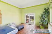 Wohnzimmer mit Terrassenzugang - 5 Zimmer Doppelhaushälfte zum Kaufen in Faulenrost