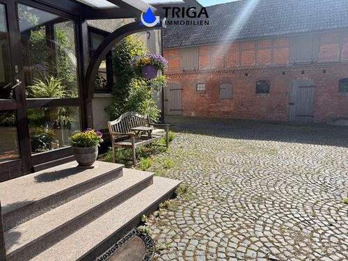 Ausgang vom Wintergarten zum Hof - Einfamilienhaus mit 185,00 m&sup2; in Werther / Kleinwechsungen zum Kaufen