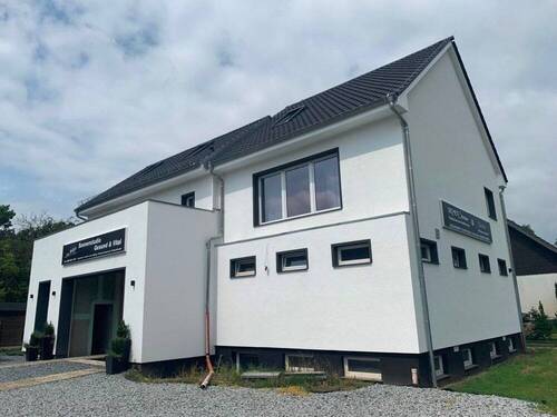 Wohn- und Geschäftshaus - Provisionsfrei im Auftrag des Gläubigers Verkauf durch Versteigerung: 2 Wohnungen und Gewerbeeinheit (Teilunterkellerung)