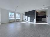 offenes Wohnzimmer mit Blick auf die Küche - Urbaner Stil, offener Schnitt: 3 Zimmer mit Loggia, TG & Keller - sofort frei