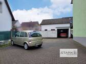 Außenansicht Garage und Stellflächen.jpg - Mehrfamilienhaus, Wohnhaus mit 265,00 m² in Kist zum Kaufen