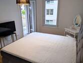 Schlafzimmer mit Balkon - 