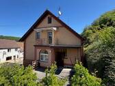 Seitenansicht - 8 Zimmer Mehrfamilienhaus, Wohnhaus zum Kaufen in Welchweiler