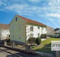 Vierfamilienhaus mit genehmigter Ausbauoption für das DG - voll vermietet! - Kist