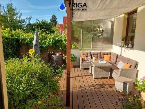 Blick auf die überdachte Terrasse - Einfamilienhaus mit 120,00 m&sup2; in Nordhausen zum Kaufen