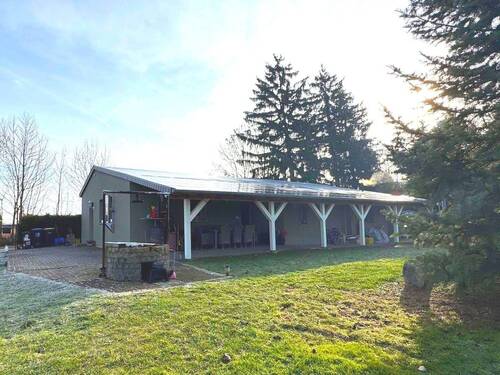 Außenansicht mit überdachter Terrasse - 3 Zimmer Bungalow zum Kaufen in Am Ettersberg