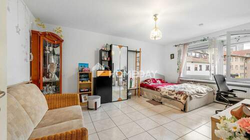 Wohnzimmer 1 - 2 Zimmer Etagenwohnung zum Kaufen in Essen