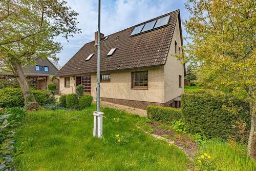 Vorgarten - Einfamilienhaus mit 192,00 m² in Tökendorf zum Kaufen